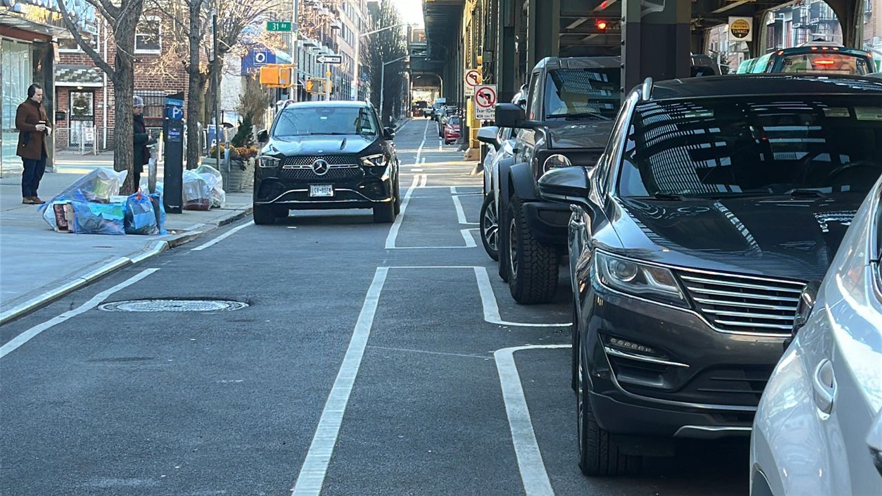 The city's Department of Transportation began bike lane installation in August despite objections from the local firehouse, a school and businesses along 31st Street. (Spectrum News NY1/Samantha Liebman)