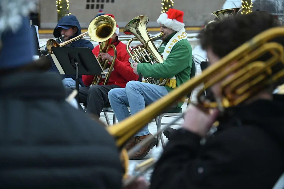 Holiday Tubas perform during the New York State Tree Lighting and Firework Festival at the Empire State Plaza on Sunday in Albany. (Lori Van Buren/Times Union)