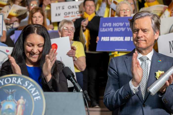State Sen. Brad Hoylman-Sigal, and Sen. Jessica Scarcella-Spanton lead a news conference on the Million Dollar Staircase at the New York State Capitol in Albany ahead of Monday's vote.
