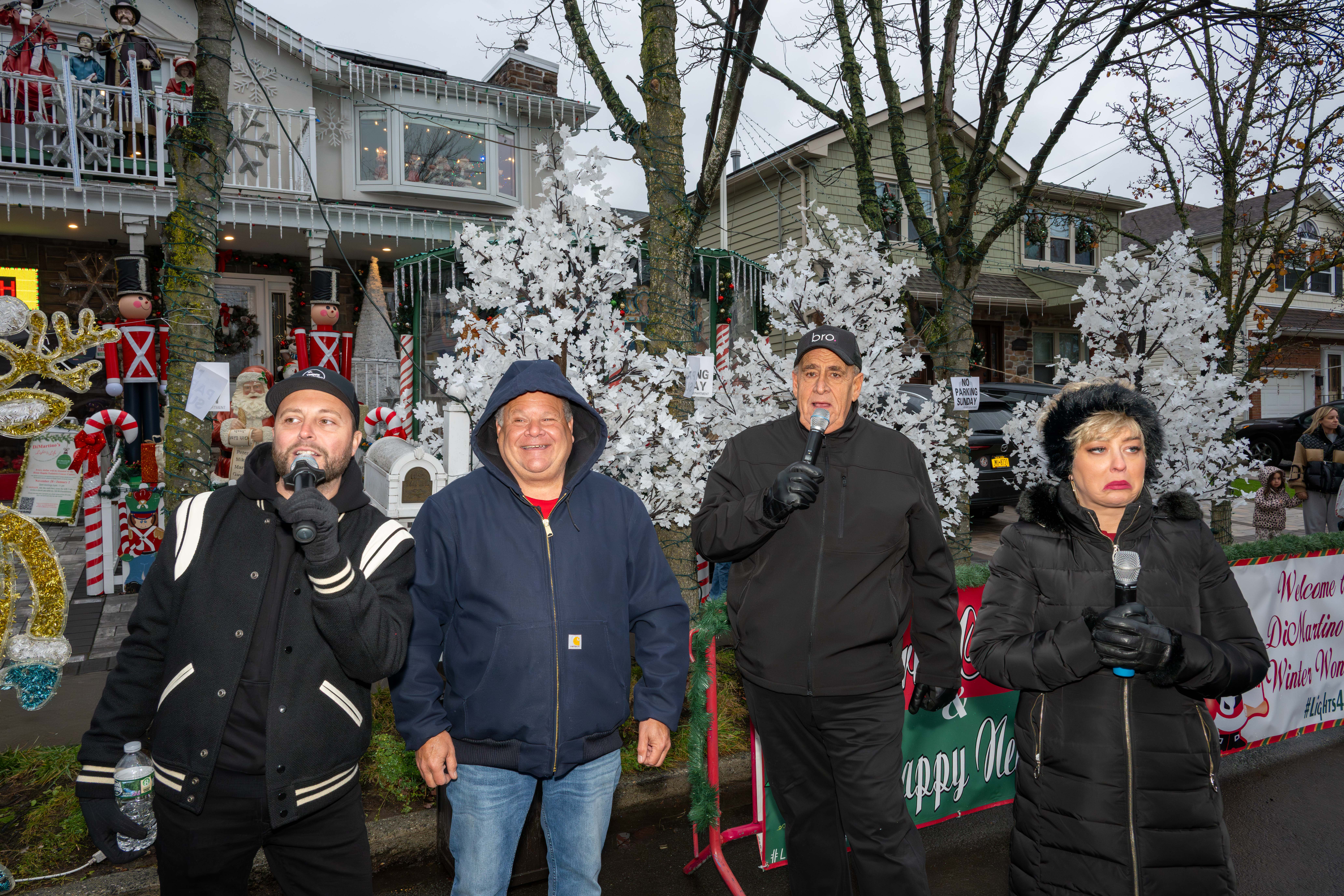 From the left, 77 WABC deejay Vinnie Medugno, Joseph DiMartino, WCBS-FM 101.1 deejay Joe Causi, and Kristin Falcone help kick off Staten Island’s famous “Lights For Life” Christmas display at the home of Joseph and Marisa DiMartino on Sunday, November 30, 2025, in Charleston. (Owen Reiter for the Advance/SILive.com)
