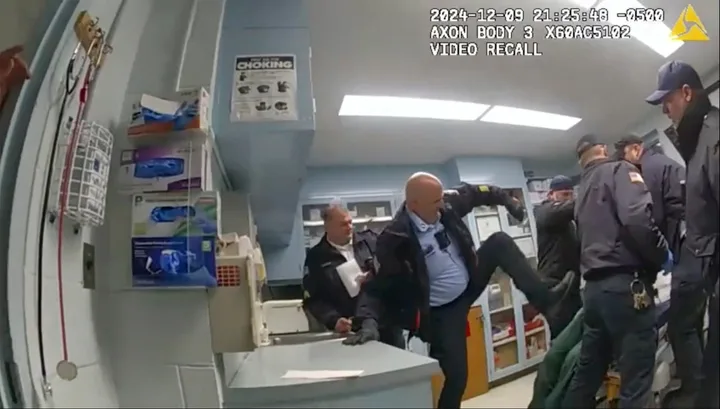 This image provided by the New York State Attorney General office shows body camera footage of correction officers beating a handcuffed man, Robert Brooks, at the Marcy Correctional Facility in Oneida County, N.Y., Dec. 9, 2024. (New York State Attorney General office via AP, File)