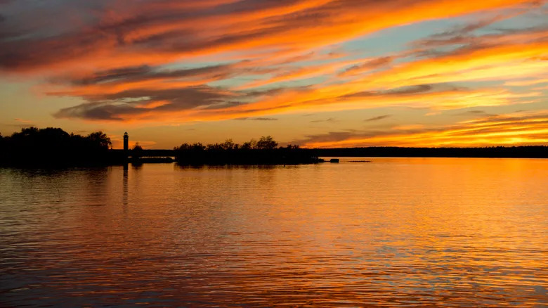 Sunset over the Oswegatchie River junction with the St. Lawrence Seaway and Ogdensburg Harbor Lighthouse