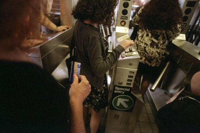 Riders take advantage of Metrocard transfers as they enter s