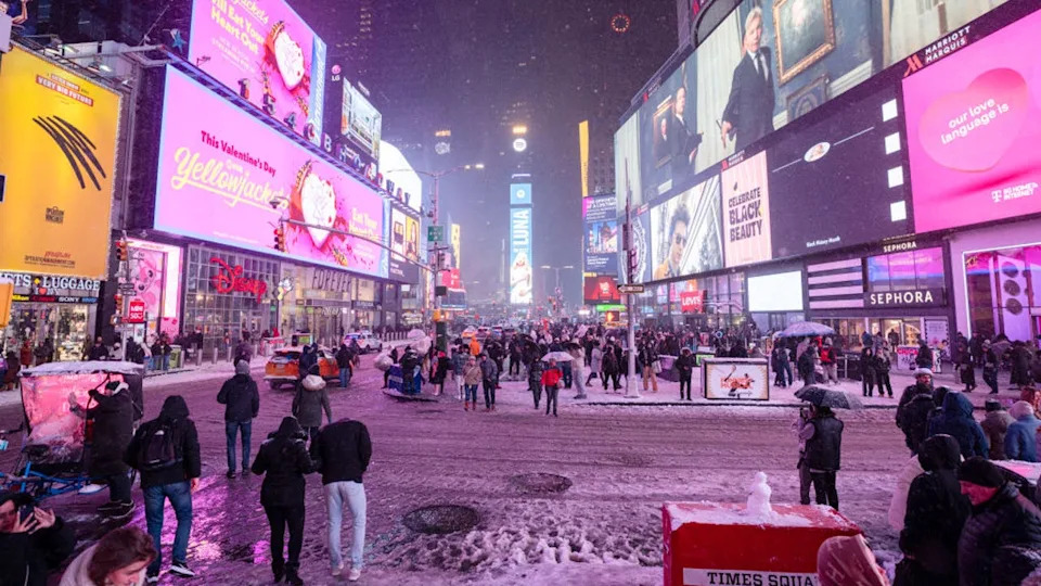 <div>NEW YORK, NEW YORK - FEBRUARY 08: People walking through Times Square during a snow storm at night on February 08, 2025 in New York City. (Photo by Craig T Fruchtman/Getty Images)</div>