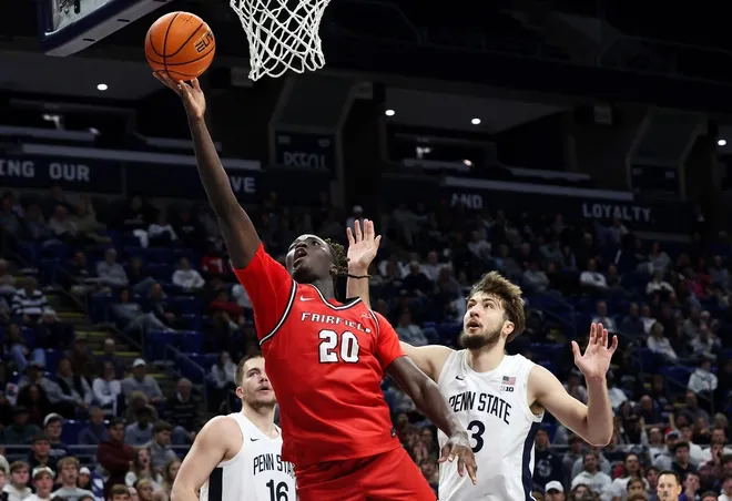 Nov 3, 2025; University Park, Pennsylvania, USA; Fairfield Stags forward Brandon Benjamin (20) drives the ball to the basket during the second half against the Penn State Nittany Lions at Bryce Jordan Center.