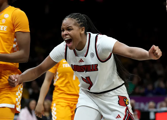 Mackenly Randolph #4 of the Louisville Cardinals celebrates in the fourth quarter against the Tennessee Lady Volunteers during the 2025 Women's Champions Classic at Barclays Center on December 20, 2025 in the Brooklyn borough of New York City.