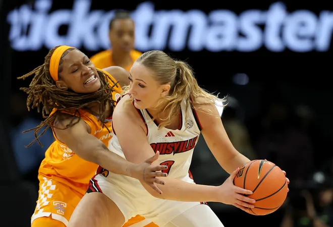Laura Ziegler #0 of the Louisville Cardinals controls the ball as Janiah Barker #0 of the Tennessee Lady Volunteers defends during the 2025 Women's Champions Classic at Barclays Center on December 20, 2025 in the Brooklyn borough of New York City.