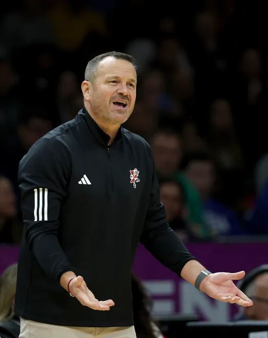 Jeff Walz of the Louisville Cardinals reacts in the second half against the Tennessee Lady Volunteers during the 2025 Women's Champions Classic at Barclays Center on December 20, 2025 in the Brooklyn borough of New York City.