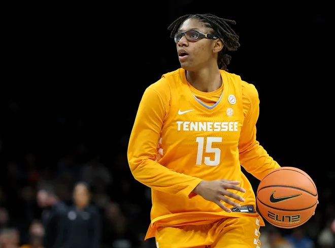 Jaida Civil #15 of the Tennessee Lady Volunteers controls the ball in the first half against the Louisville Cardinals during the 2025 Women's Champions Classic at Barclays Center on December 20, 2025 in the Brooklyn borough of New York City.