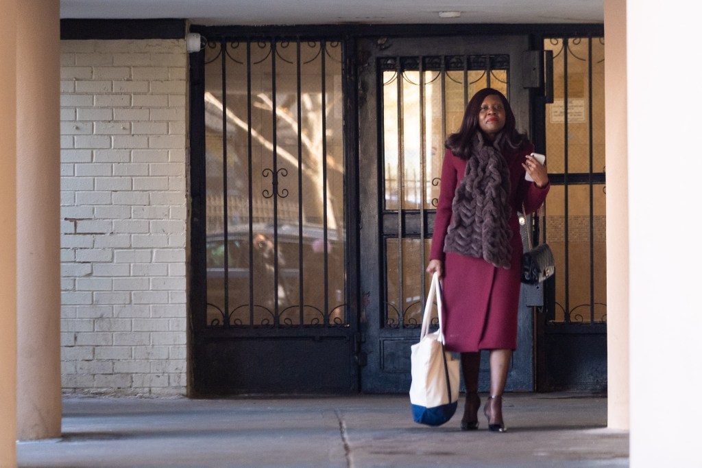 Lisa White leaving her apartment building at 47 McKeever Place, Brooklyn.