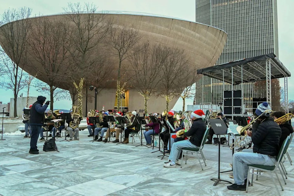 Holiday Tubas perform during the New York State Tree Lighting and Firework Festival at the Empire State Plaza on Sunday in Albany. (Lori Van Buren/Times Union)