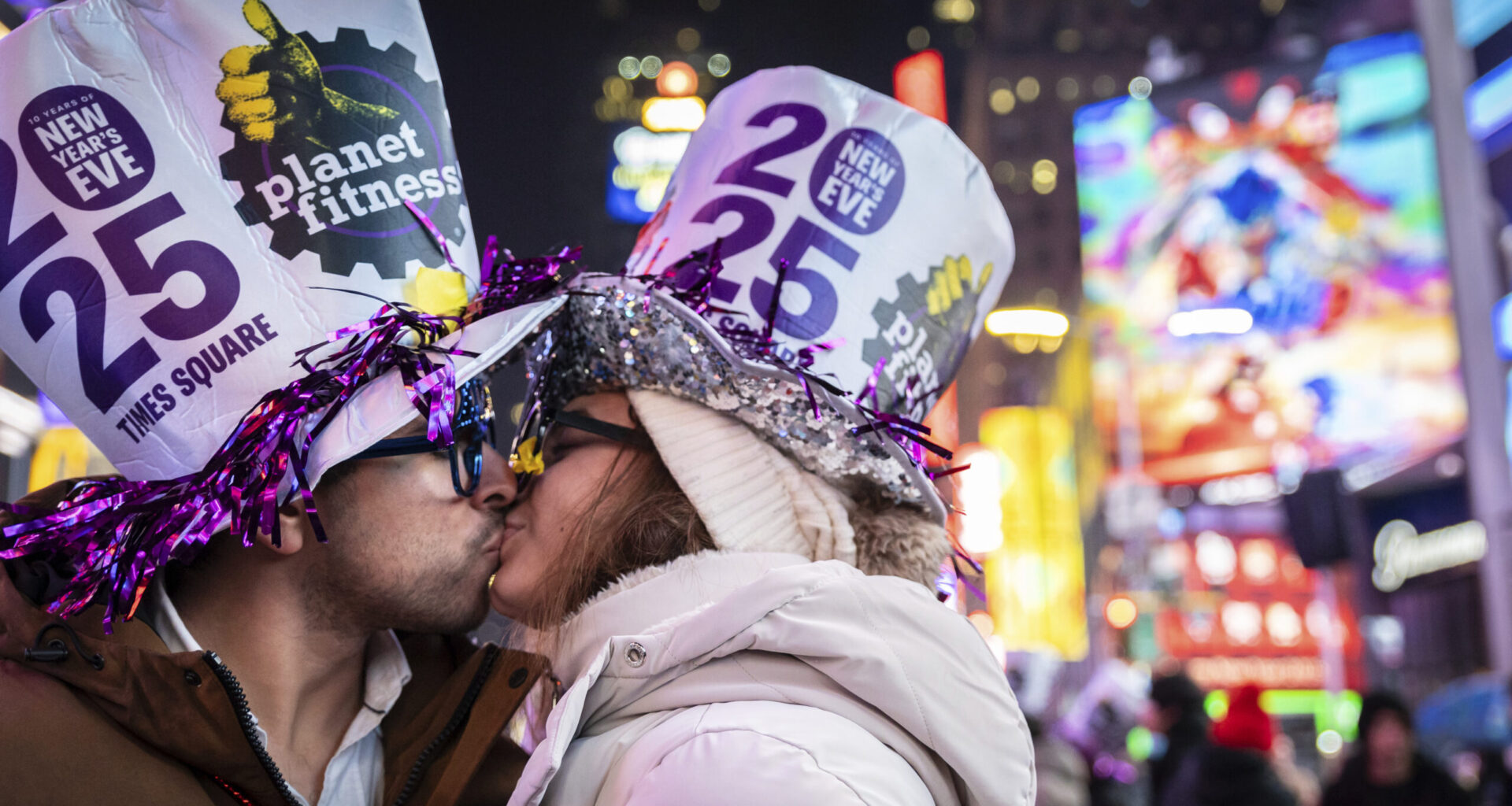 A couple kiss after the ball drops in New York's Times Square, Wednesday, Jan. 1, 2025, in New York. Photo: Stefan Jeremiah/AP