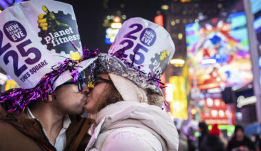 A couple kiss after the ball drops in New York's Times Square, Wednesday, Jan. 1, 2025, in New York. Photo: Stefan Jeremiah/AP
