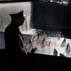 William Staudt, a firefighter that worked at Ground Zero on the day of the attacks, looks over a reflecting pool during a ceremony to mark the 24th anniversary of the 9/11 attacks, Thursday, Sept. 11, 2025, in New York. AP Photo/Seth Wenig
