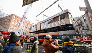 A 60-foot, 50-ton diner from Williamsburg is lifted into the air by crane and placed onto a flatbed truck for transport to its new home at Steiner Studios, Saturday, Dec. 6, 2025, in Brooklyn. The beloved Diner is being saved by Steiner Studios owner, Doug Steiner. Photo by Diane Bondareff/AP Content Services for Steiner Studios