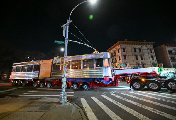 A 60-foot, 50-ton Diner from Williamsburg, Brooklyn is transported through the streets of New York City to its new home at Steiner Studios, Saturday, Dec. 6, 2025, in Brooklyn. Photo by Diane Bondareff/AP Content Services for Steiner Studios