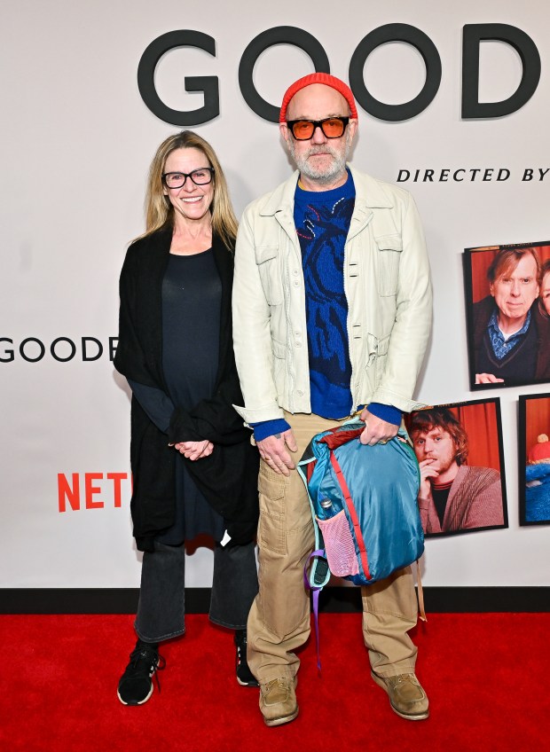 Michael Stipe, right, and guest attend the special screening of "Goodbye June" at The Whitby Hotel on Monday, Dec. 8, 2025, in New York. (Photo by Evan Agostini/Invision/AP)