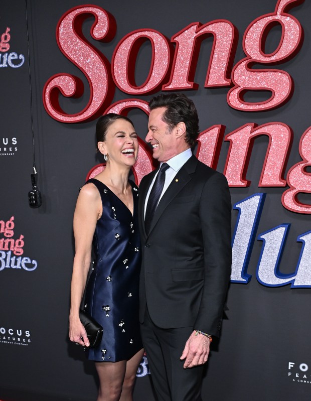 Sutton Foster, left, and Hugh Jackman attend the premiere of "Song Sung Blue" at AMC Lincoln Square on Thursday, Dec. 11, 2025, in New York. (Photo by Evan Agostini/Invision/AP)