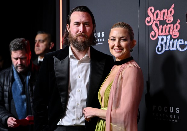 Kate Hudson, right, and boyfriend Danny Fujikawa attend the premiere of "Song Sung Blue" at AMC Lincoln Square on Thursday, Dec. 11, 2025, in New York. (Photo by Evan Agostini/Invision/AP)