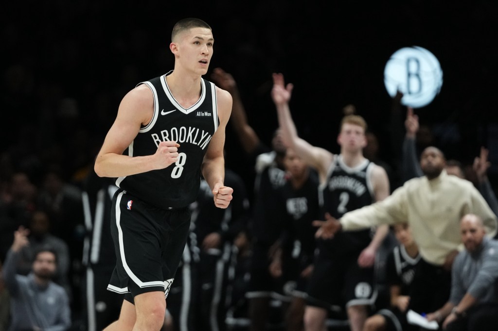 Brooklyn Nets' Egor Demin (8) celebrates after making a three-point shot during the second half of an NBA basketball game against the Golden State Warriors Monday, Dec. 29, 2025, in New York. 