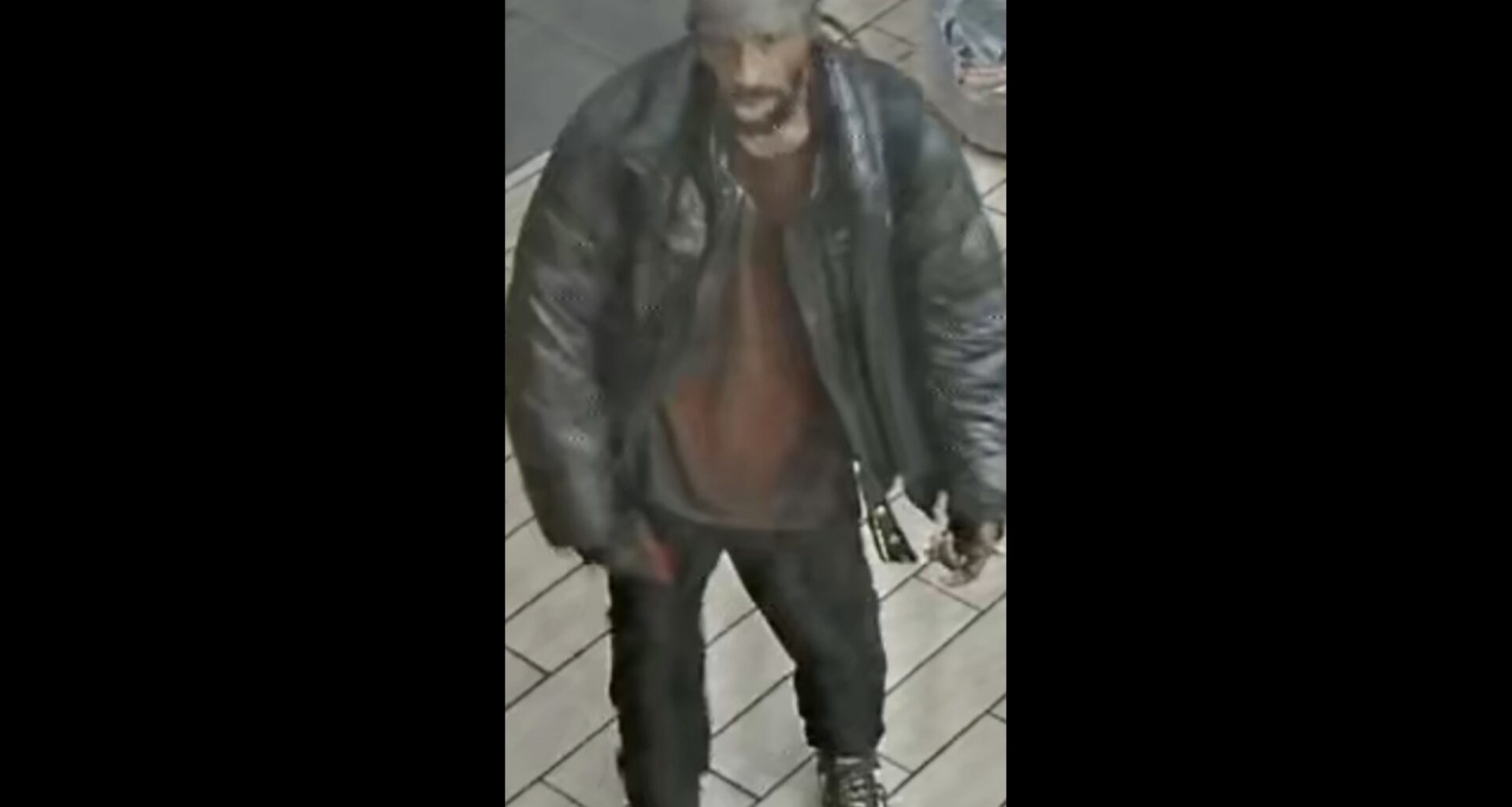 Police are looking for this man accused of assaulting a senior citizen on Fulton Street and injuring her. Photo: NYPD