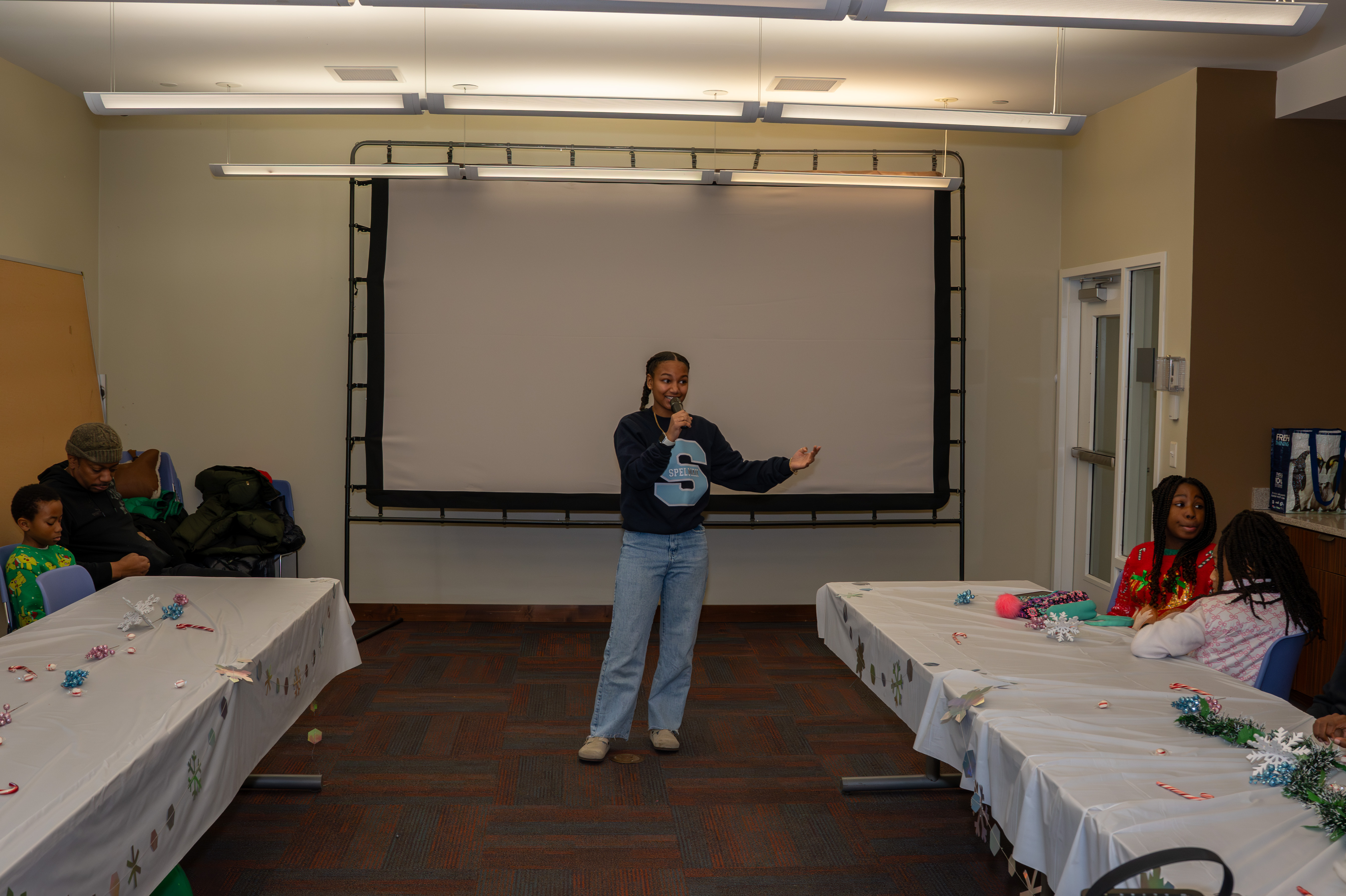 Kamora Freelend, the youngest African-American female pilot to earn her private pilot's license, speaks to middle school students at a meeting of Jack and Jill of America, Staten Island Tweens, at the College of Staten Island in Willowbrook on Saturday, Dec. 20, 2025. (Owen Reiter for the Advance/SILive.com)