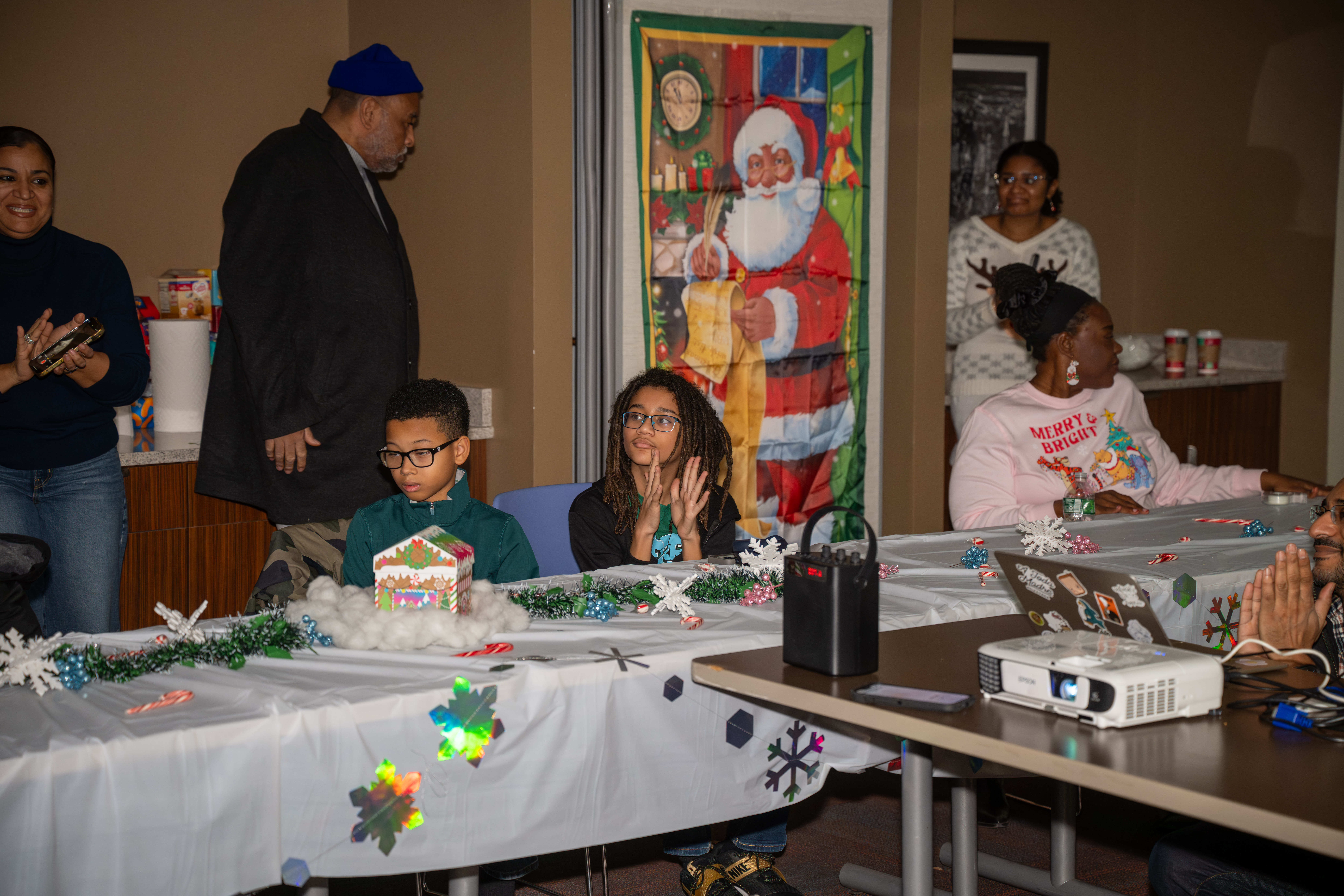 Kamora Freelend, the youngest African-American female pilot to earn her private license, and student pilot Sophie Robinson speak to middle school students at a meeting of Jack and Jill of America, Staten Island Tweens at the College of Staten Island in Willowbrook on Saturday, Dec. 20, 2025. (Owen Reiter for the Advance/SILive.com)