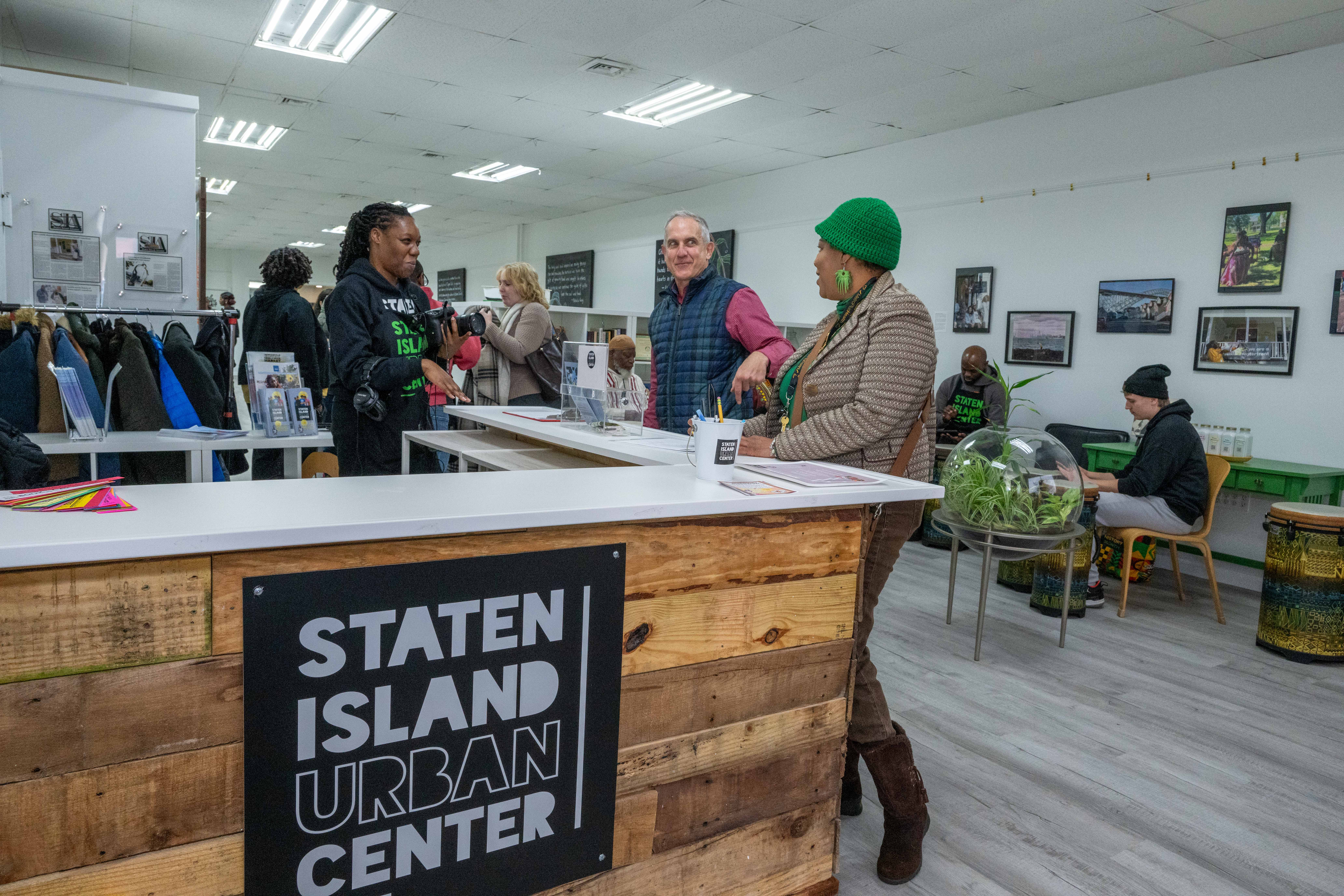 More than one hundred people turned out for the grand opening of the Staten Island Urban Center’s new storefront at 206 Bay Street in Tompkinsville on Saturday, December 6, 2025. (Owen Reiter for the Advance/SILive.com)