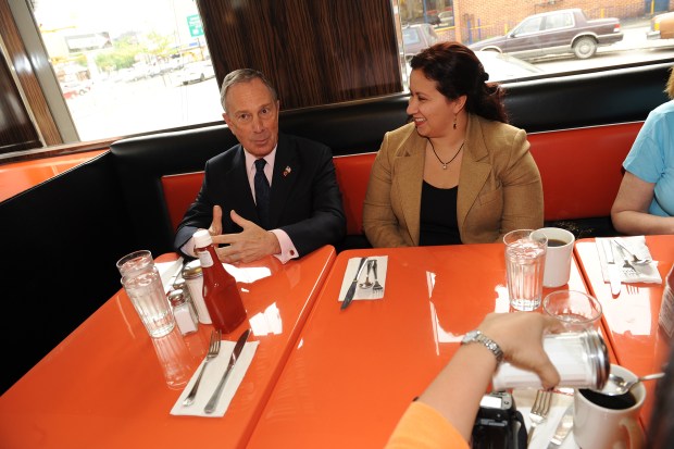 Mayor Michael Bloomberg chats with Helen Arteaga at Pop Diner on Queens Blvd. in Queens, New York, in 2009. (Debbie Egan-Chin / New York Daily News)