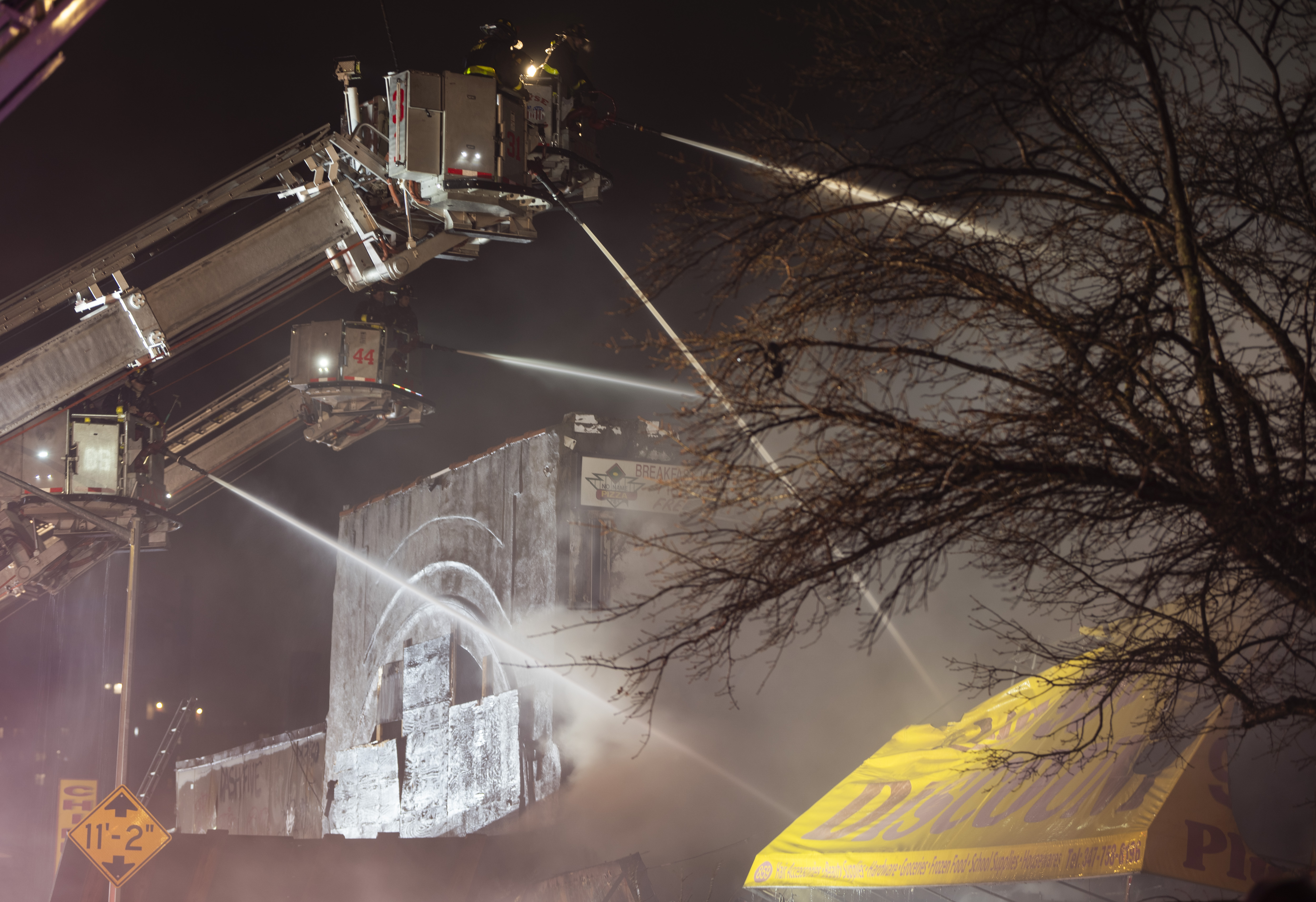 Multiple tower  ladders operated in an attempt to knock down heavy fire throughout multiple commercial buildings at 558 Prospect Avenue on Thursday, December 18.