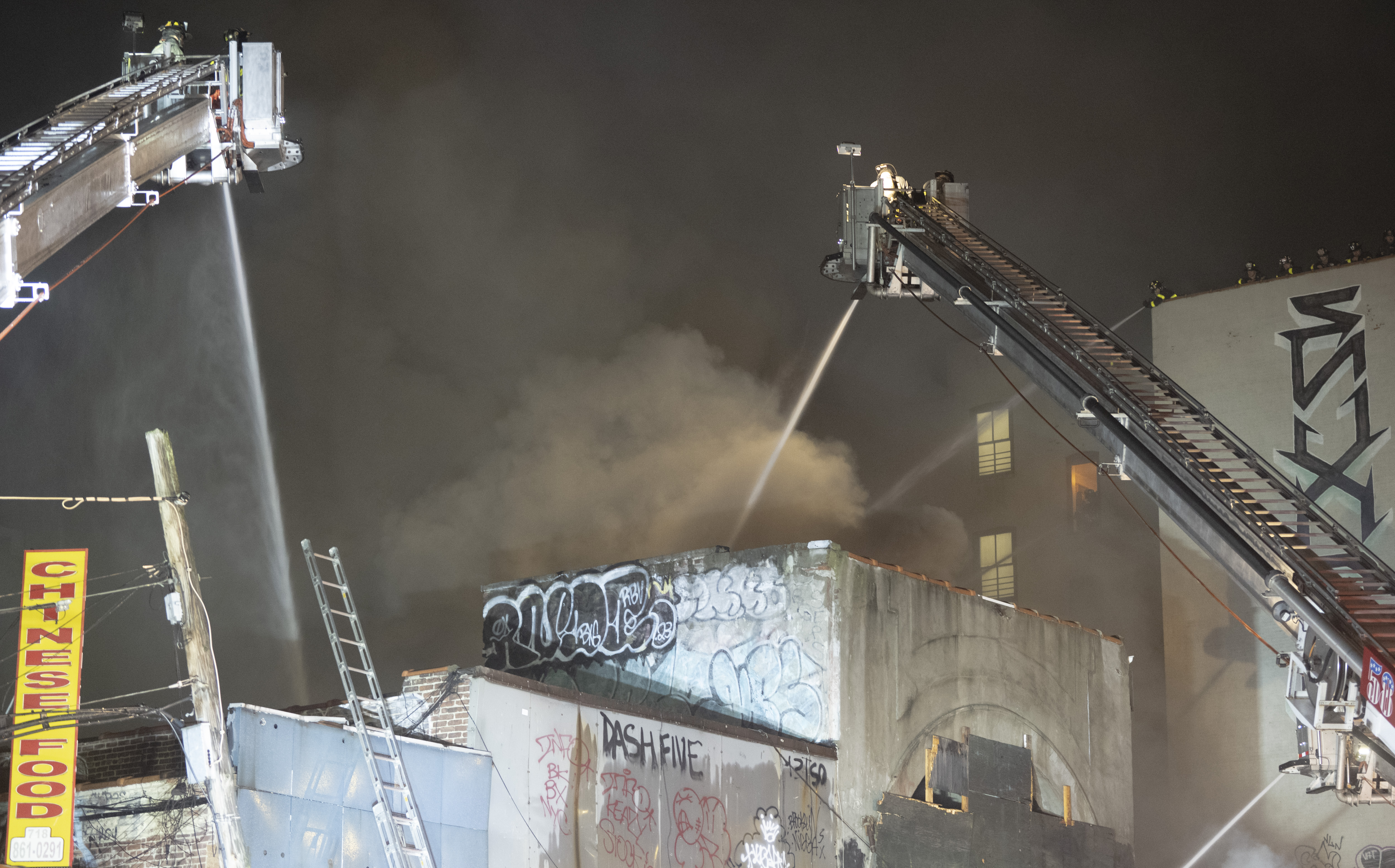 Firefighters were forced into a defensive operation as heavy fire consumed multiple buildings on Prospect Avenue on Thursday into Friday morning.