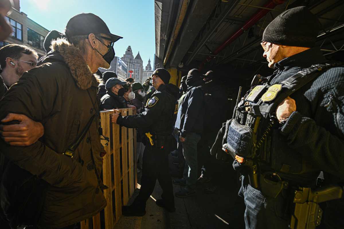 Mayhem erupted outside of a Chinatown parking garage on Saturday after protesters learned of a massive ICE presence inside.