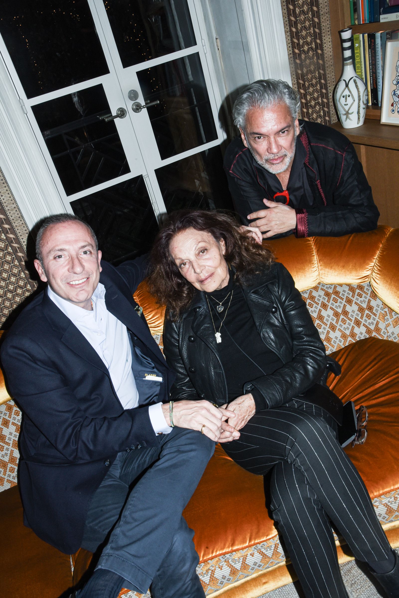 Image may contain Diane von Fürstenberg Clothing Coat Jacket Blazer Couch Furniture Face Head and Person