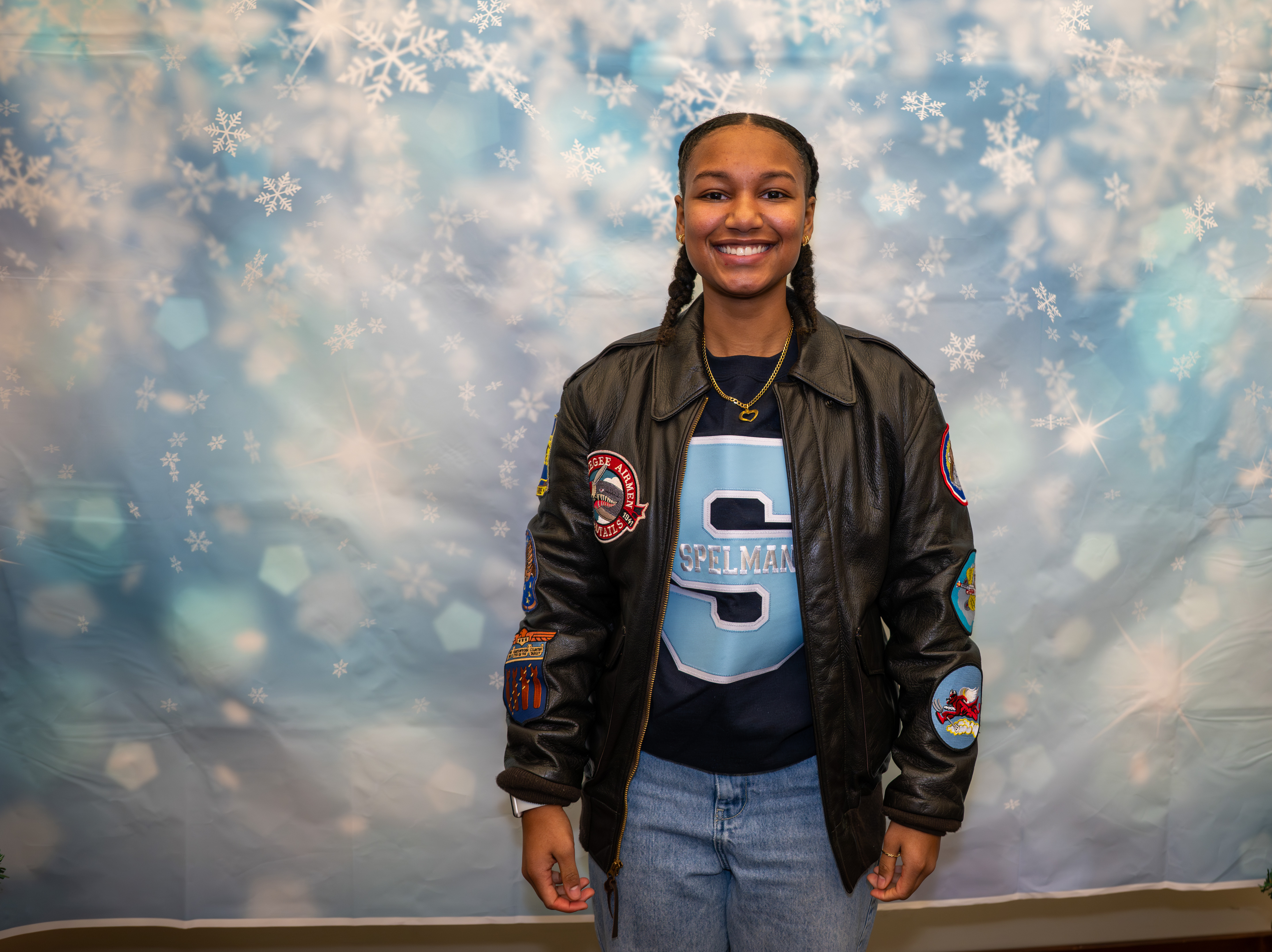 Kamora Freelend, the youngest African-American female pilot to earn her private pilot's license, wears her Tuskegee Airmen jacket while speaking to middle school students at a meeting of Jack and Jill of America, Staten Island Tweens, at the College of Staten Island in Willowbrook on Saturday, Dec. 20, 2025. (Owen Reiter for the Advance/SILive.com)