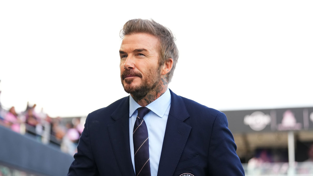 Inter Miami CF president and co-owner David Beckham walks onto the pitch prior to the first half against the New England Revolution at Chase Stadium.