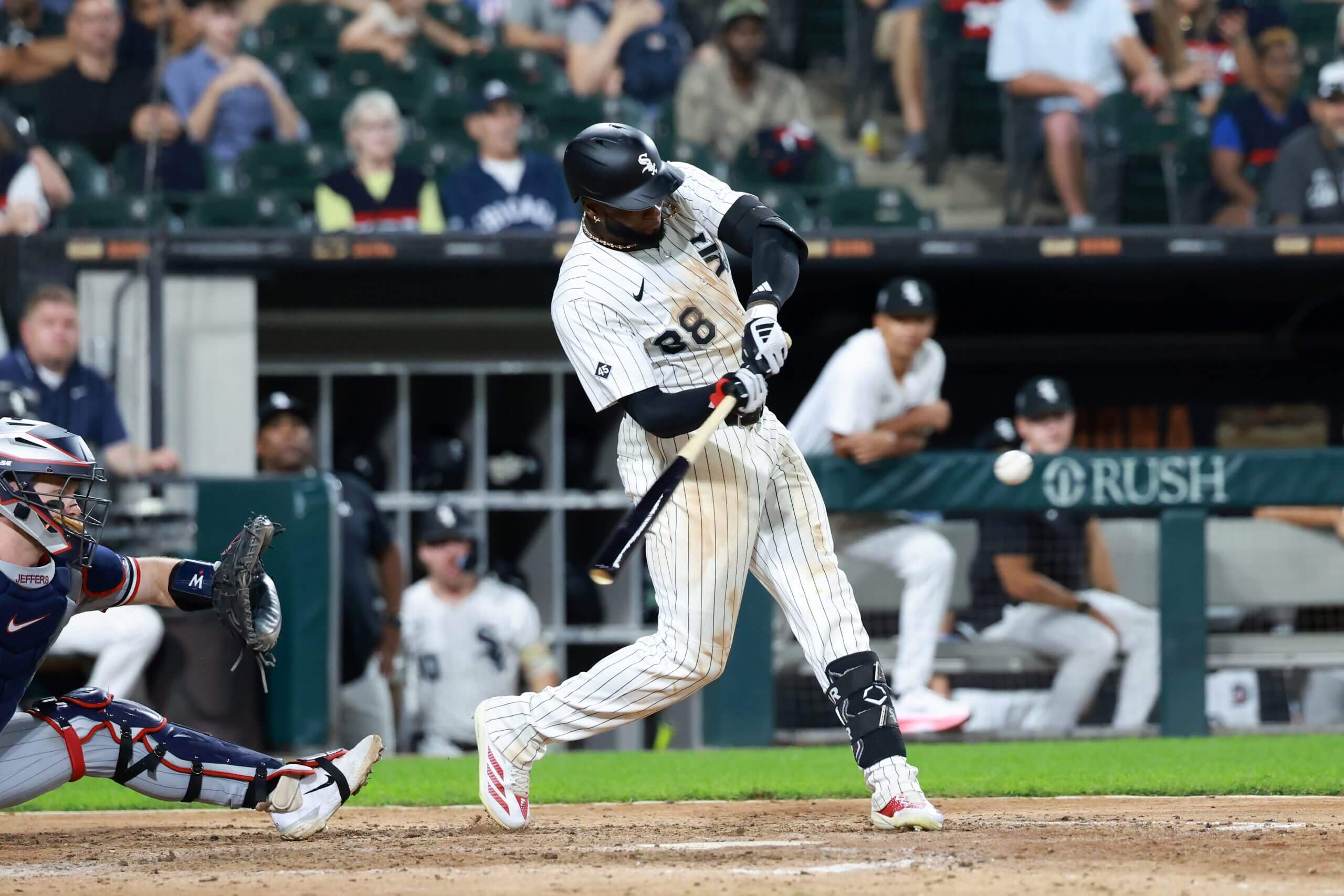 Luis Robert Jr. of the White Sox takes a swing in a game in August.