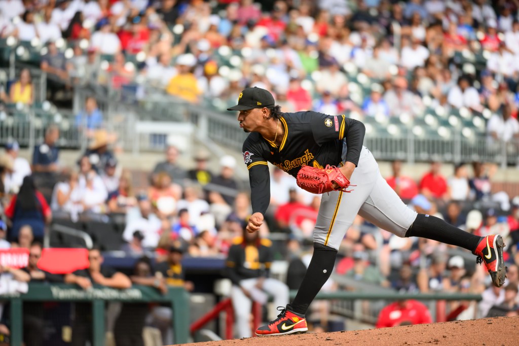 Johan Oviedo #24 of the Pittsburgh Pirates pitches in the first inning of a game against the Atlanta Braves at Truist Park on September 28, 2025 in Atlanta, Georgia.
