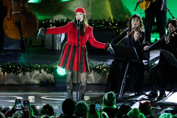Icelandic singer Laufey performs during the Rockefeller Center Christmas Tree Lighting in New York on December 3, 2025. (Photo by CHARLY TRIBALLEAU / AFP via Getty Images)