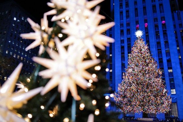 The Christmas tree stands illuminated moments after being lit during the Rockefeller Center Christmas Tree Lighting in New York City on December 3, 2025. (Photo by CHARLY TRIBALLEAU / AFP via Getty Images)