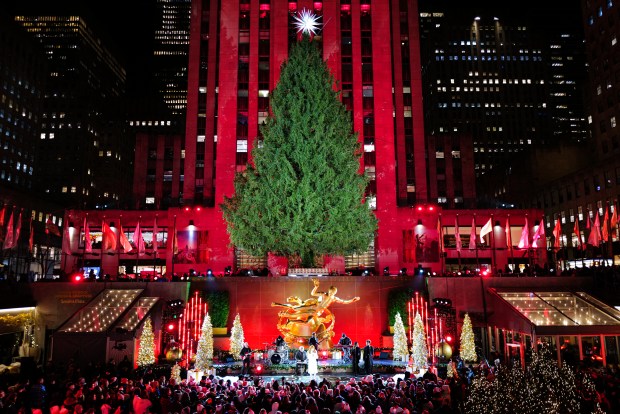 The Christmas tree is seen before being lit during the Rockefeller Center Christmas Tree Lighting in New York City on December 3, 2025. (Photo by CHARLY TRIBALLEAU / AFP via Getty Images)