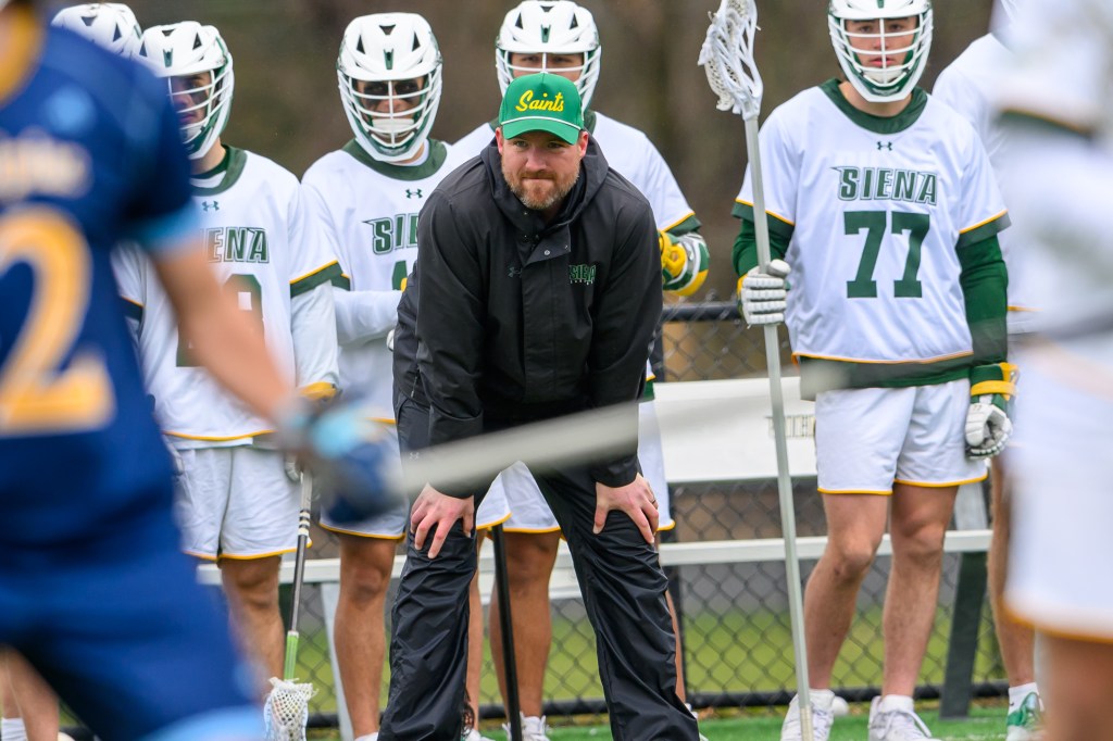 Siena head coach Liam Gleason watches his team play against Quinnipiac on Saturday, April 12, 2025, in Colonie, NY. 