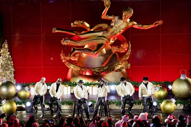 NEW YORK, NEW YORK - DECEMBER 03: New Edition performs during the 2025 Rockefeller Center Christmas Tree Lighting Ceremony on December 03, 2025 in New York City. (Photo by Theo Wargo/Getty Images)