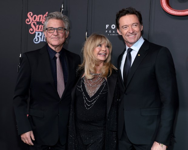 NEW YORK, NEW YORK - DECEMBER 11: (L-R) Kurt Russell, Goldie Hawn and Hugh Jackman attend the "Song Sung Blue" New York Premiere at AMC Lincoln Square Theater on December 11, 2025 in New York City. (Photo by Dimitrios Kambouris/Getty Images)