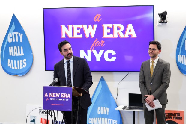 Mayor-elect Zohran Mamdani speaks during a press conference Monday to announce the appointment of Sam Levine (right) as a Commissioner of the Department of Consumer and Worker Protection.