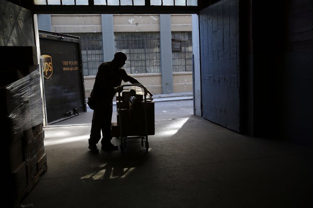 A UPS driver makes a delivery to Industry City in Brooklyn.