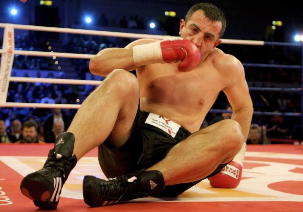 Goran Gogic of Germany ends up on the floor in the Heavyweight fight against Pedro Carrion during the Arena Boxing Night at the Alterdorfer Sporthalle on December 15, 2006 in Hamburg, Germany. (Photo by Friedemann Vogel/Bongarts/Getty Images)