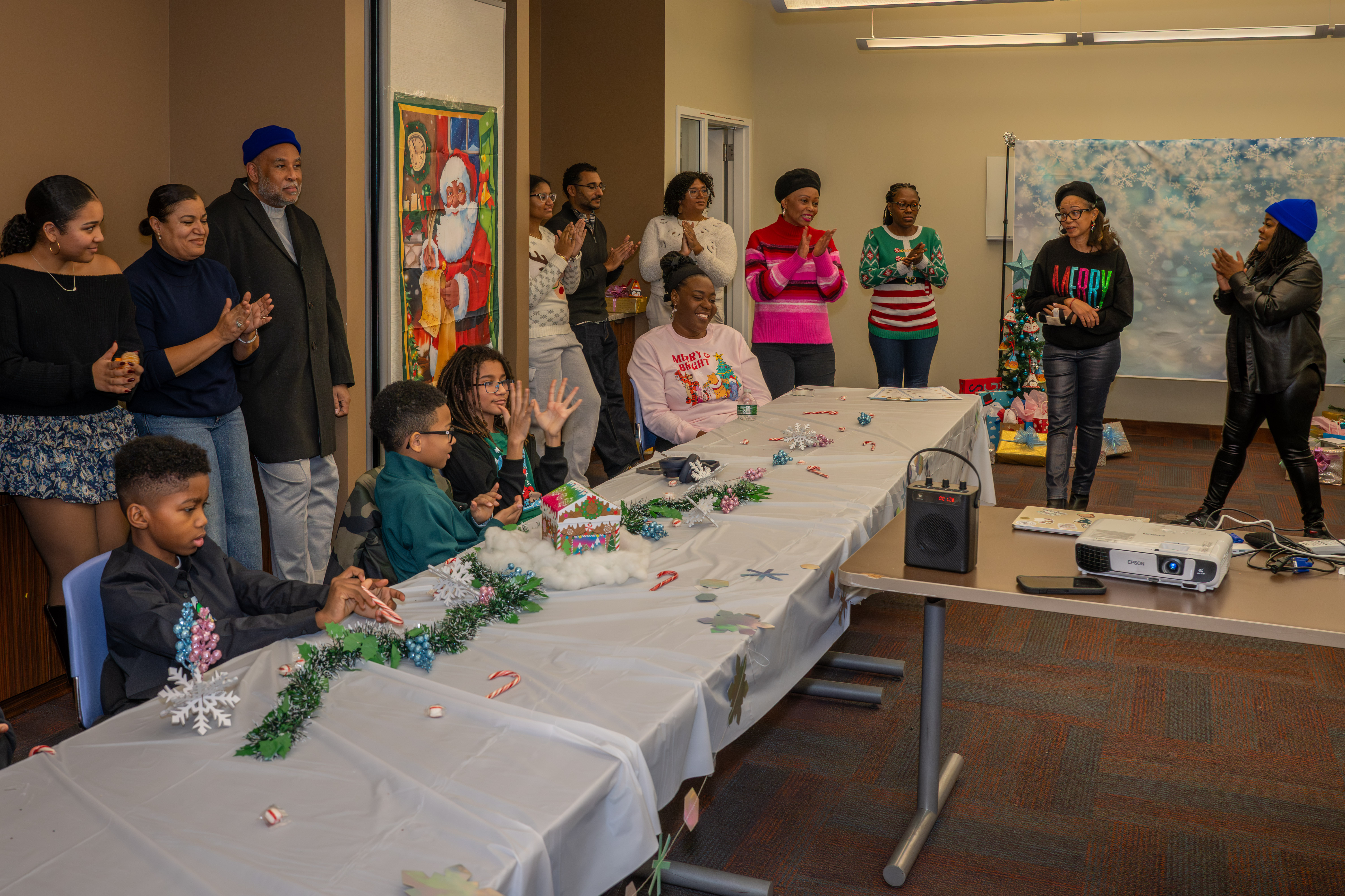 Kamora Freelend, the youngest African-American female pilot to earn her private license, and student pilot Sophie Robinson speak to middle school students at a meeting of Jack and Jill of America, Staten Island Tweens at the College of Staten Island in Willowbrook on Saturday, Dec. 20, 2025. (Owen Reiter for the Advance/SILive.com)