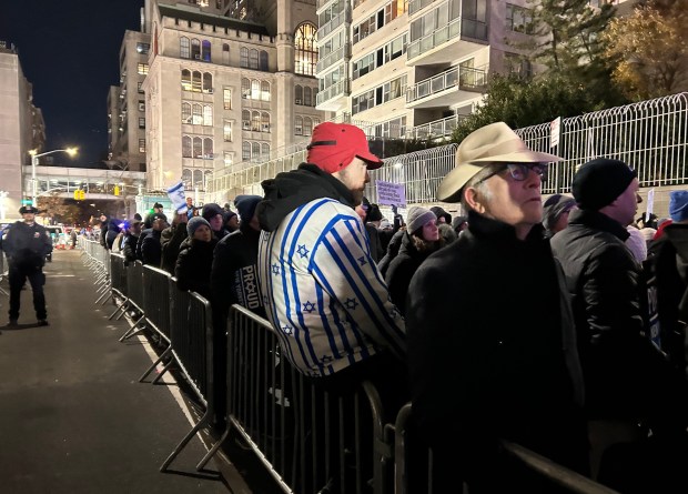 People are pictured at a rally outside Park East Synagogue in Manhattan on Thursday, Dec. 4, 2025. (Kerry Burke / New York Daily News)