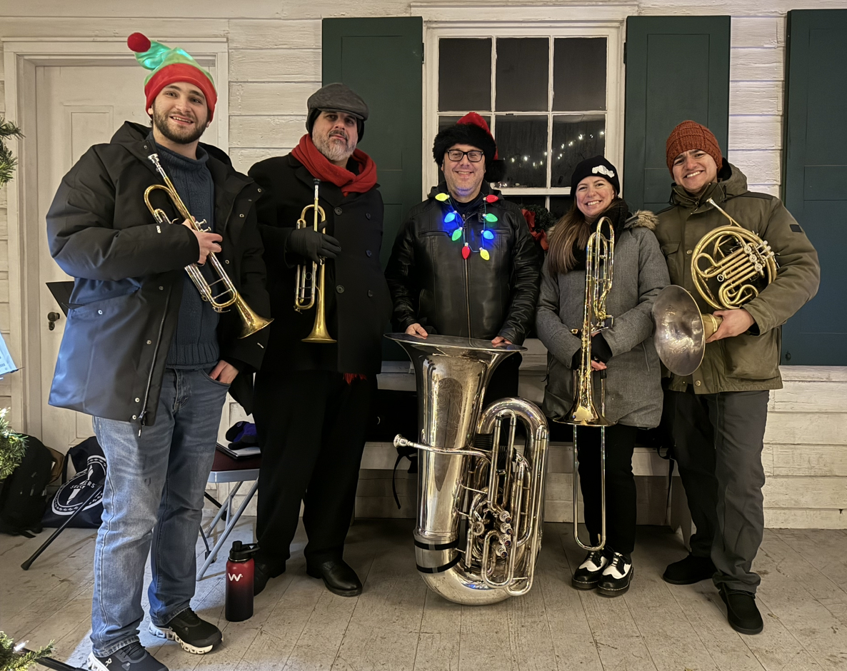 The Richmond County Quintet played  Christmas music at the tree lighting at Historic Richmondtown on Dec. 5, 2025. (Steve White for the Advance/SILive.com)