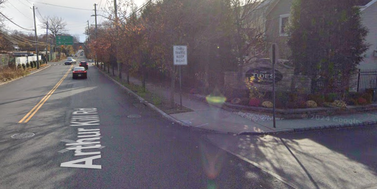 Report of overturned vehicle on Staten Island; person refuses medical attention